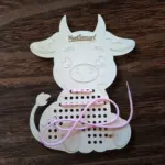 Fa fűzögetős fejlesztő játék – Boci alakban 25 cm